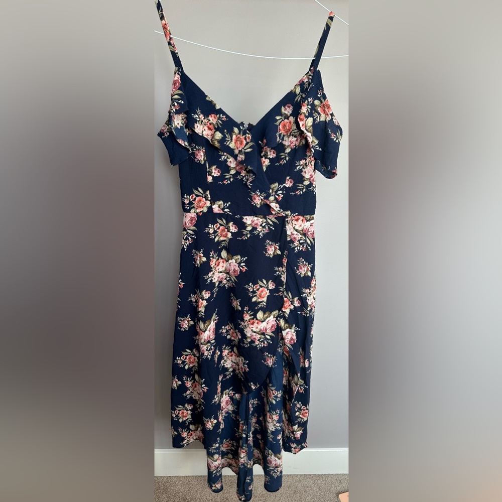 IZ BYER size 5 romper, navy floral print with ruffle.